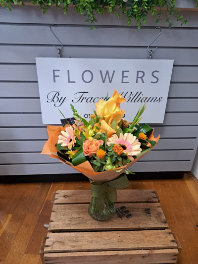 Citrus Sunrise - Capture the essence of a golden meadow with this stunning bouquet of yellow, white, and orange flowers. Presented in a stylish packaging it's perfect for adding natural beauty to any space