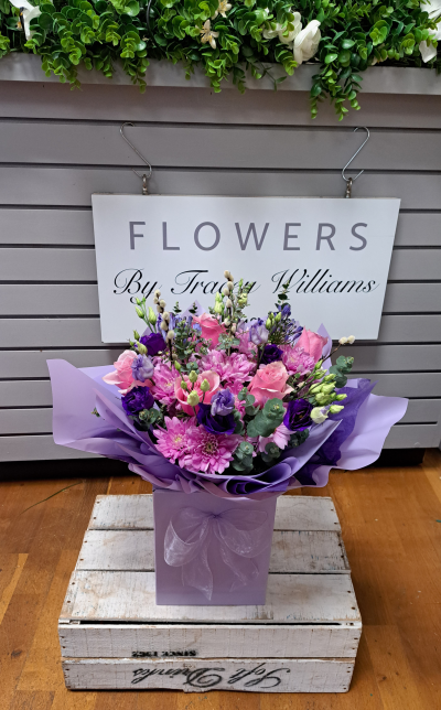 Sympathy Flowers SYM-336 - A selection of carefully selected pink, white, and green flowers and complementary foliage in an aqua bubble of water.
Every product is handmade and delivered by Flowers By Tracey Williams. The pictures shown are recent examples of actual arrangements designed by our talented florists. We cannot guarantee what the flower varieties or colour will be, unless specified on the product description.
